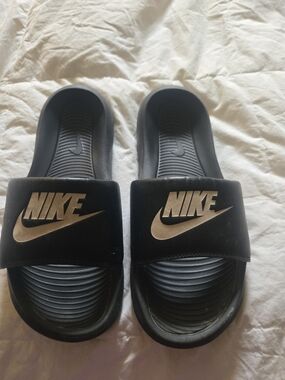Nike Black  Slides with Pink Logo Accent